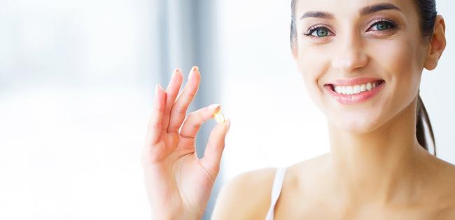 vrouw met mooie huid door omega 3 visolie